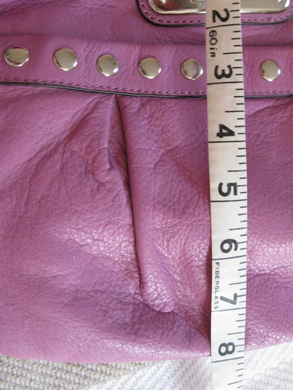 B. Makowsky purple leather crossbody handbag